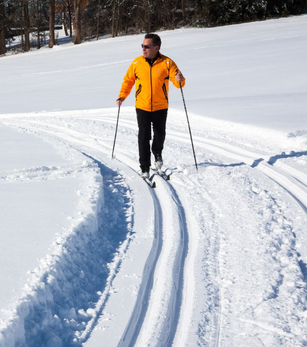 man cross country skiing