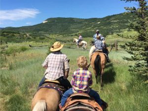 family horseback riding